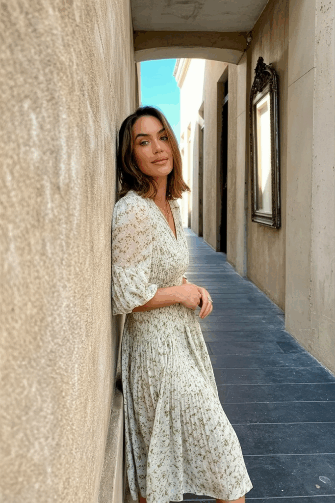 Woman wearing a soft floral print midi dress