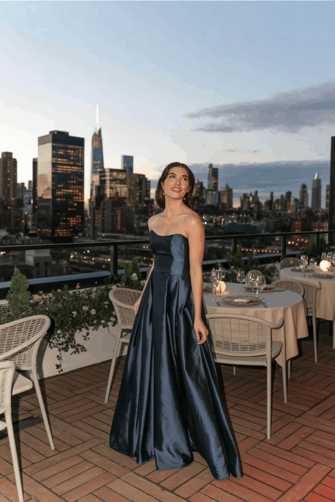 A-line midnight blue gown with soft pleats